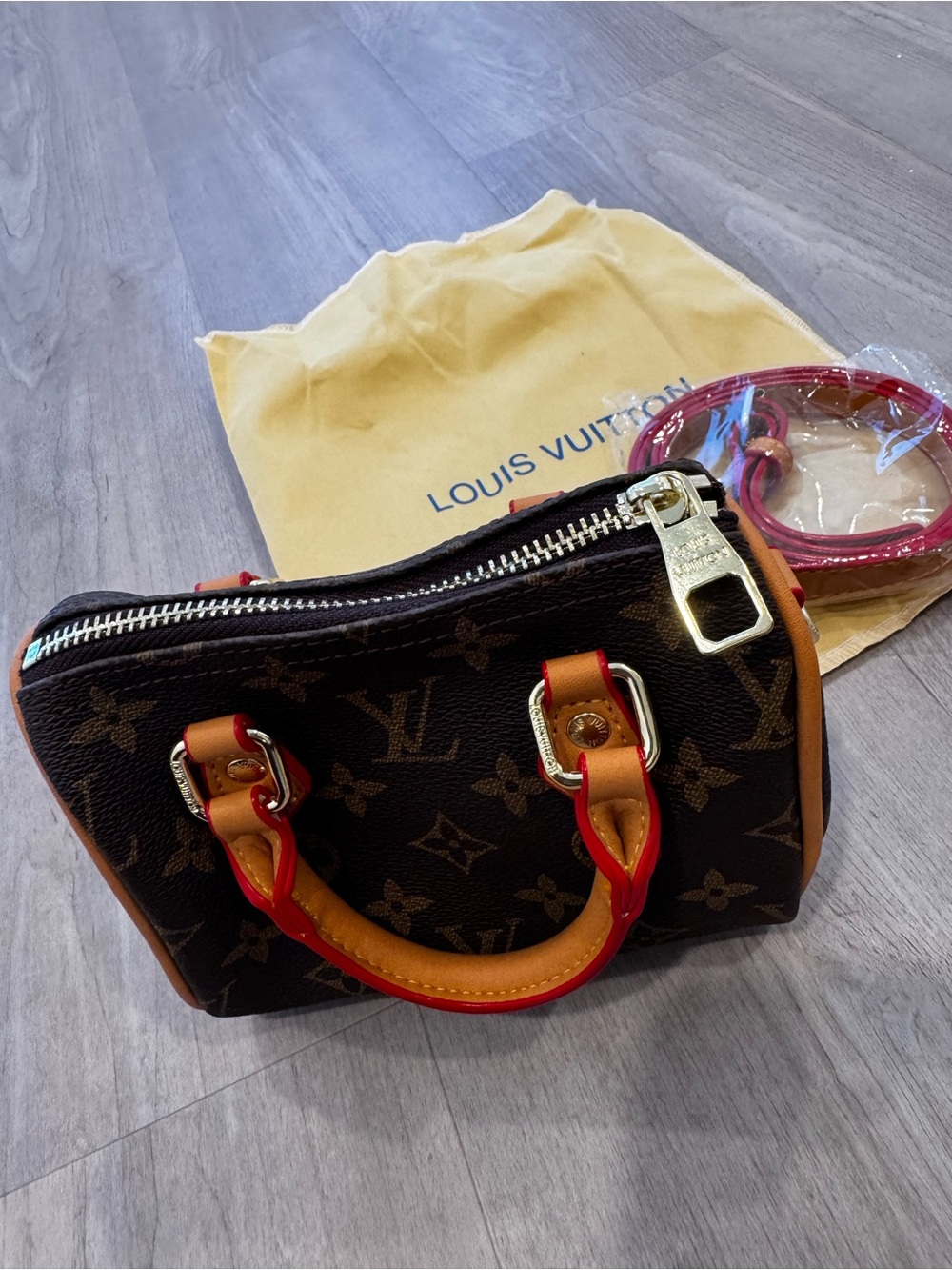 Source unknown Brown Monogram Mini Speedy with Pink Strap